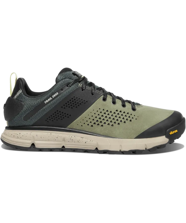 A low-cut olive green and black hiking shoe with a Vibram sole and speckled midsole, shown in profile against a white background.