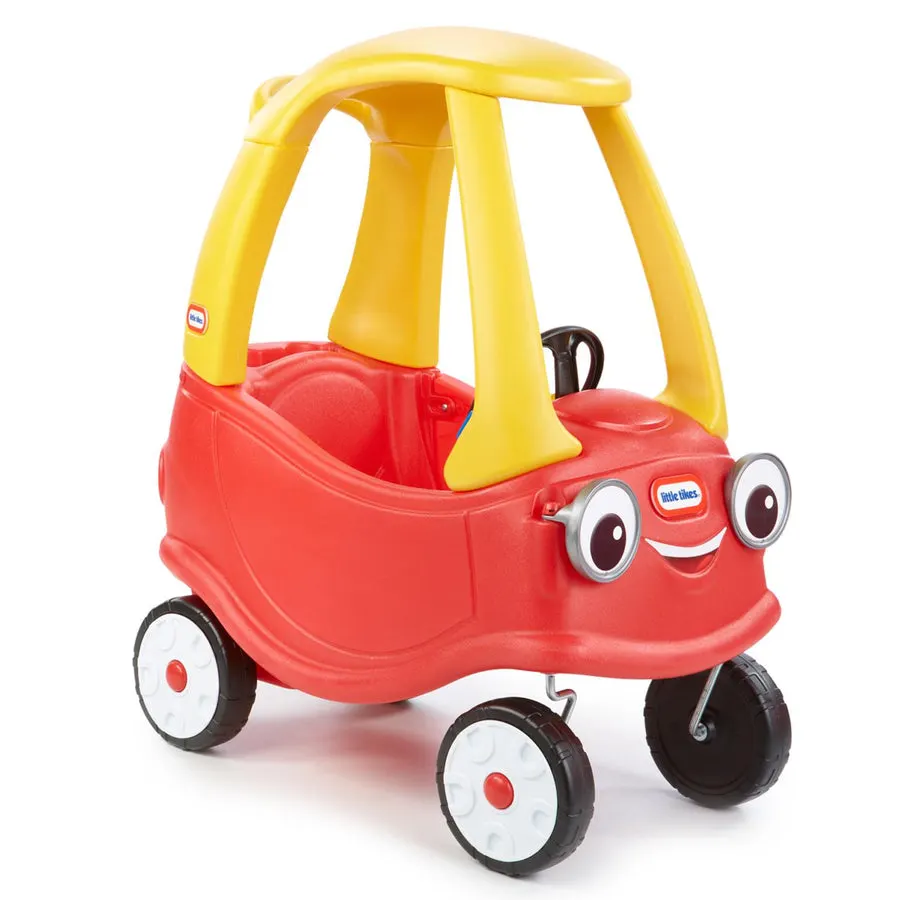 A red and yellow plastic Cozy Coupe ride-on toy car with a smiling cartoon face on the front, shown at an angle against a plain white background.