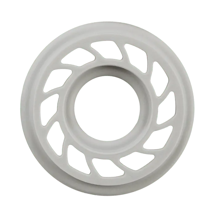 A round grey rubber vibration damper with radial cutouts, shown flat against a white background.
