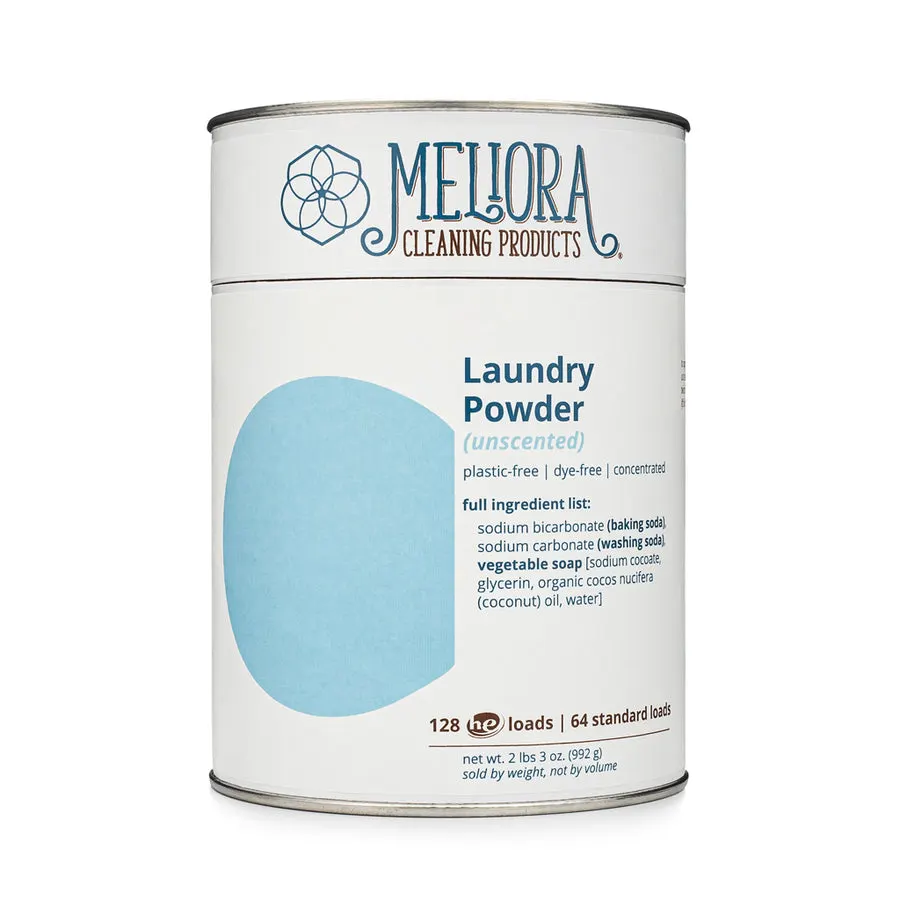 A cylindrical steel canister of Meliora unscented laundry powder detergent, labeled with a light blue accent, shown against a plain white background.