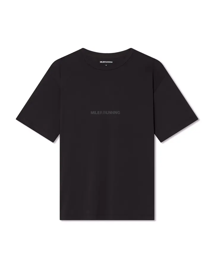 A black short-sleeve crewneck t-shirt with a woven Miler Running neck label and faint tonal logo print on the chest, shown flat on a white background.