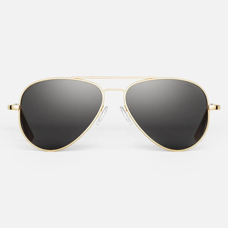 A pair of gold-framed square aviator-style sunglasses with dark gray lenses and a straight top bar, shown front-on against a plain white studio background.