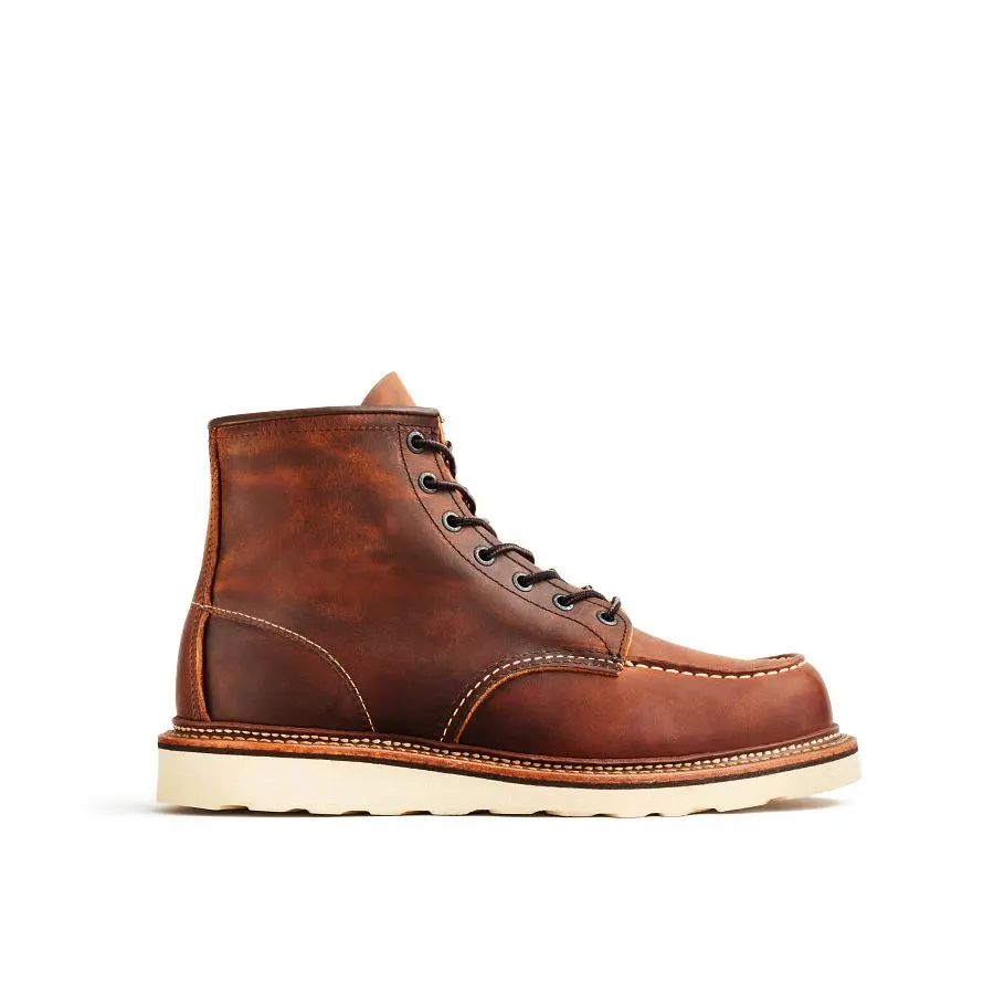 A single copper-brown leather moc-toe boot with a cream crepe sole, shown in profile against a plain white studio background.