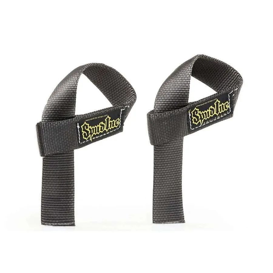 A pair of black woven nylon wrist lifting straps with yellow "Spud Inc" branded patches, laid out against a white background.
