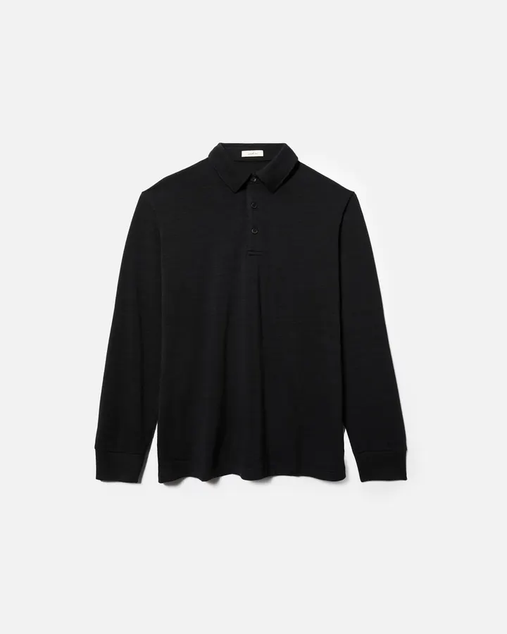 A black long-sleeve polo shirt with a three-button placket, laid flat against a plain white background.