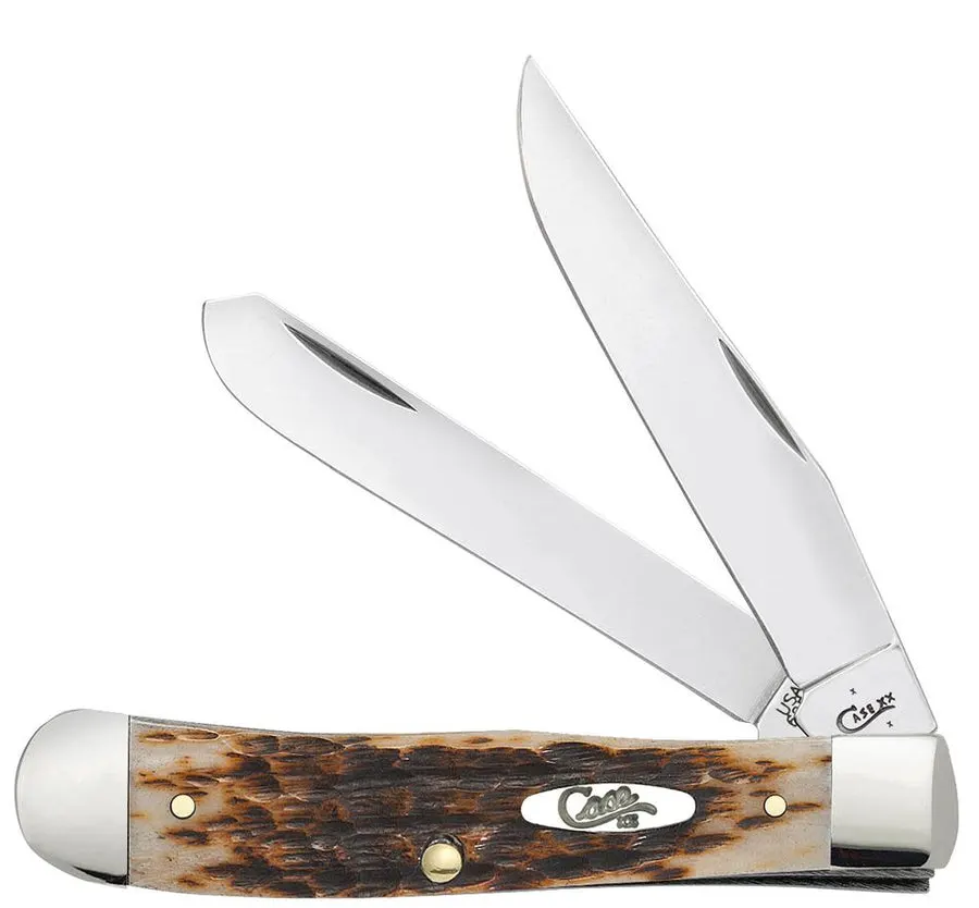 A closed two-blade trapper pocketknife with jigged amber bone handle scales and polished steel bolsters, blades fanned open against a white background.