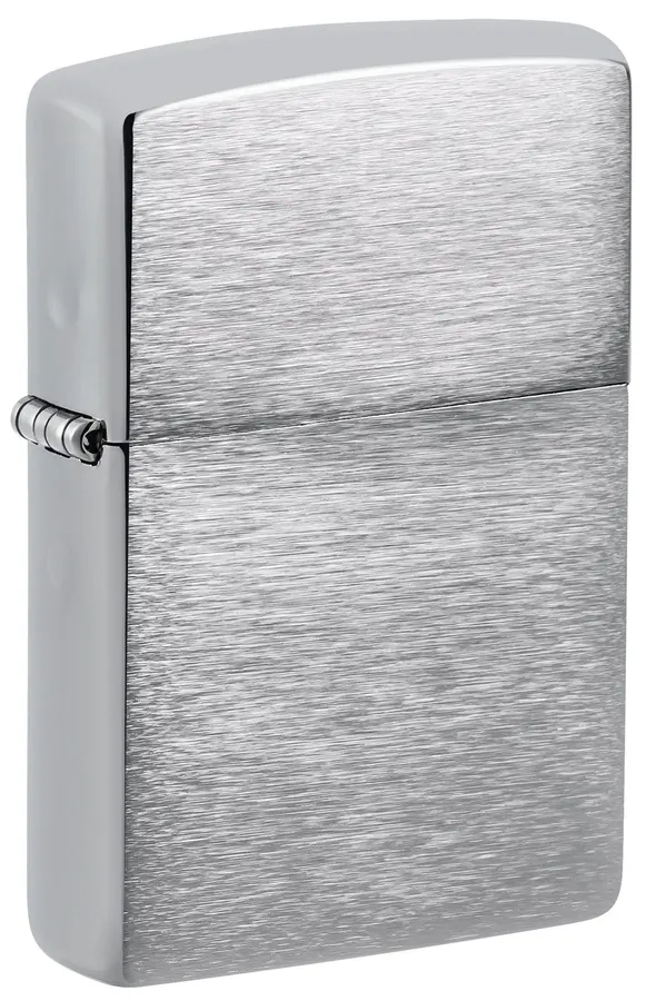 A closed rectangular brushed-chrome Zippo lighter shown at an angle, plain metal case with no engraving, on a white background.
